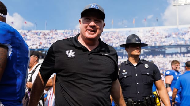 Sep 30, 2023; Lexington, Kentucky, USA; Kentucky Wildcats head coach Mark Stoops walks off the field after the game against the Florida Gators at Kroger Field. Mandatory Credit: Jordan Prather-USA TODAY Sports